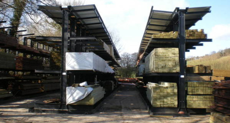 two cantilever racks for timber storage, both with canopies